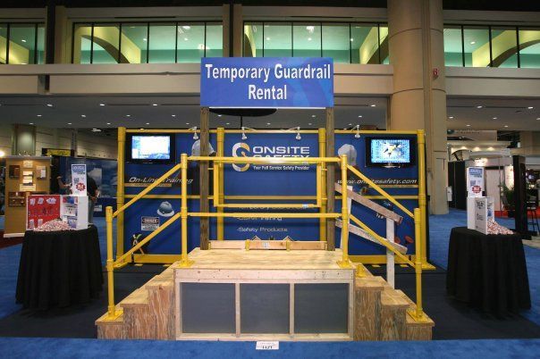 A blue sign that says temporary guardrail rental