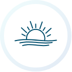 Blue house icon in a white circle.