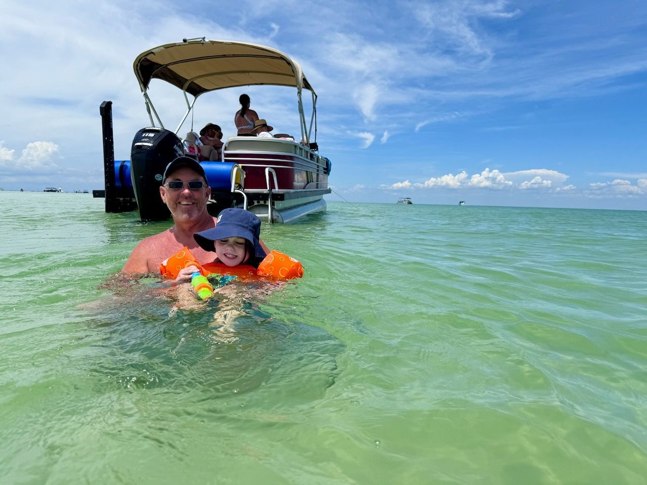 Boat renters parting on pontoon. 