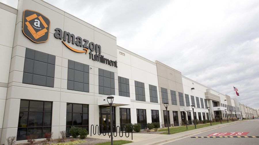 A large white building with the word amazon on it
