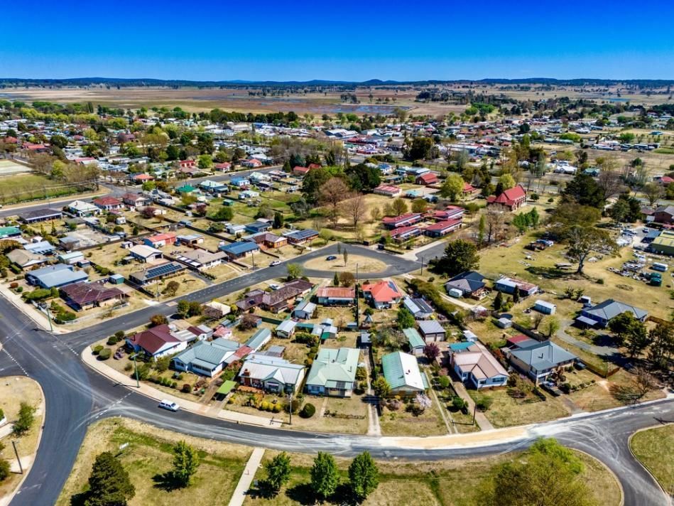Aerial View of A Small Town with Houses, Streets, and A Roundabout — New England Towing in Guyra, NSW