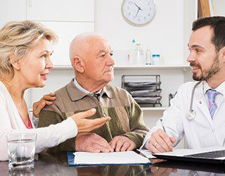 Family Doctor — Senior Couple and Doctor in Opelousas, LA