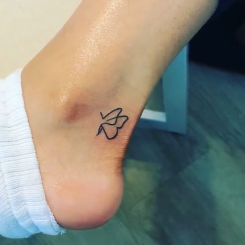 Butterfly Tattoo In Feet