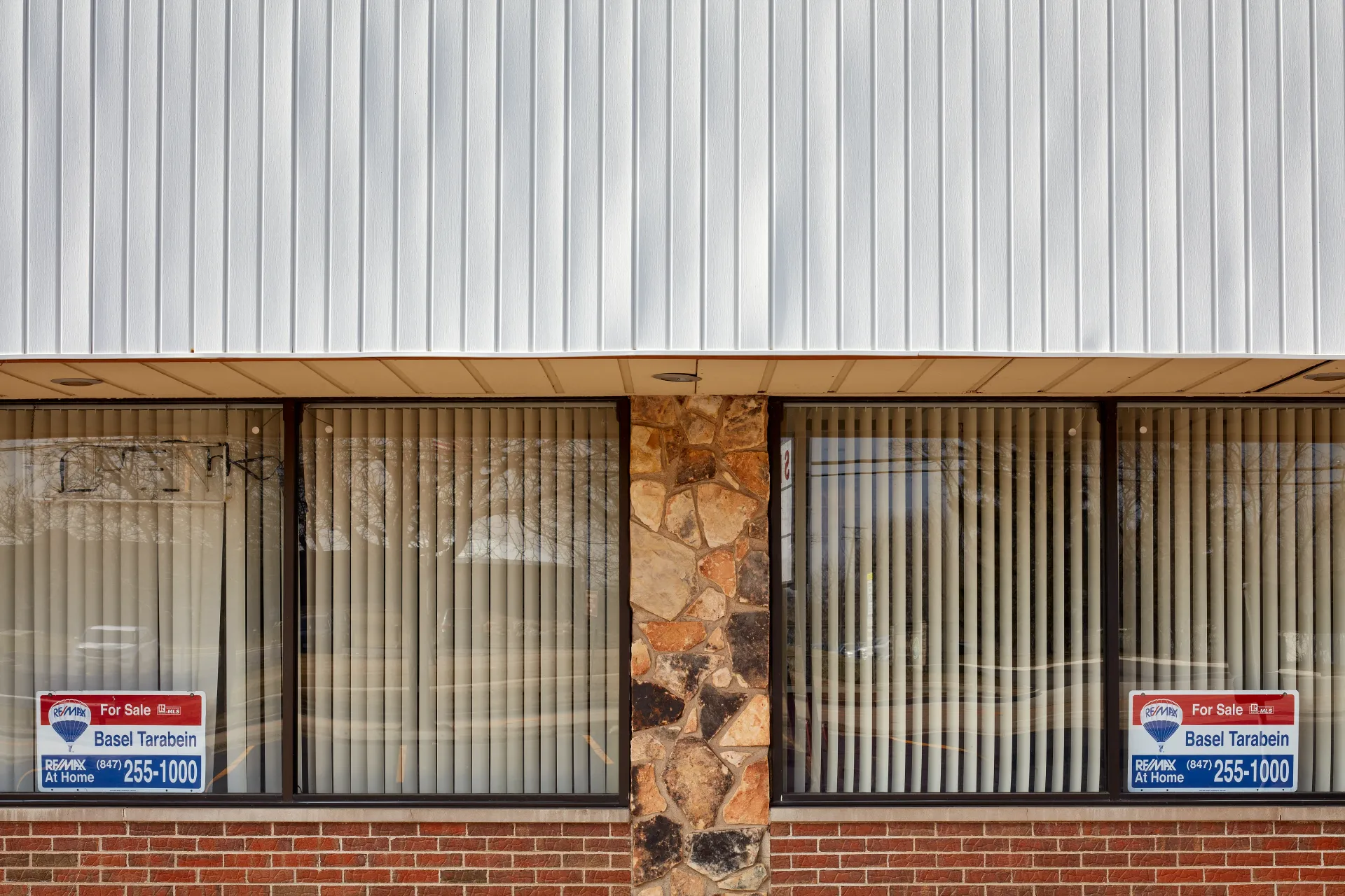 Two Store Fronts. For sale. The property buyouts that transform a town. Streamwood, Illinois 2023 - Robert Swiderski