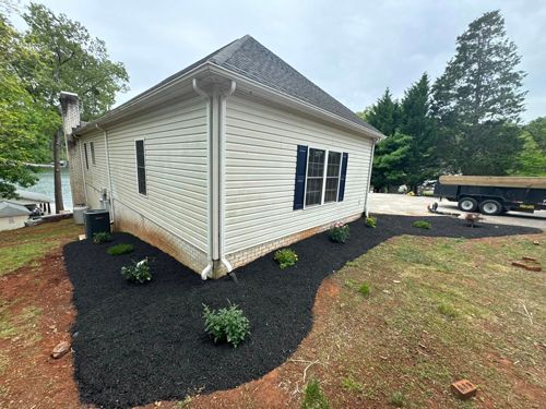 A White House With A Black Truck Parked In Front Of It - Roanoke, VA - Duncan Design & Landscaping LLC
