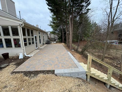 A House With A Patio And Stairs In Front Of It - Roanoke, VA - Duncan Design & Landscaping LLC