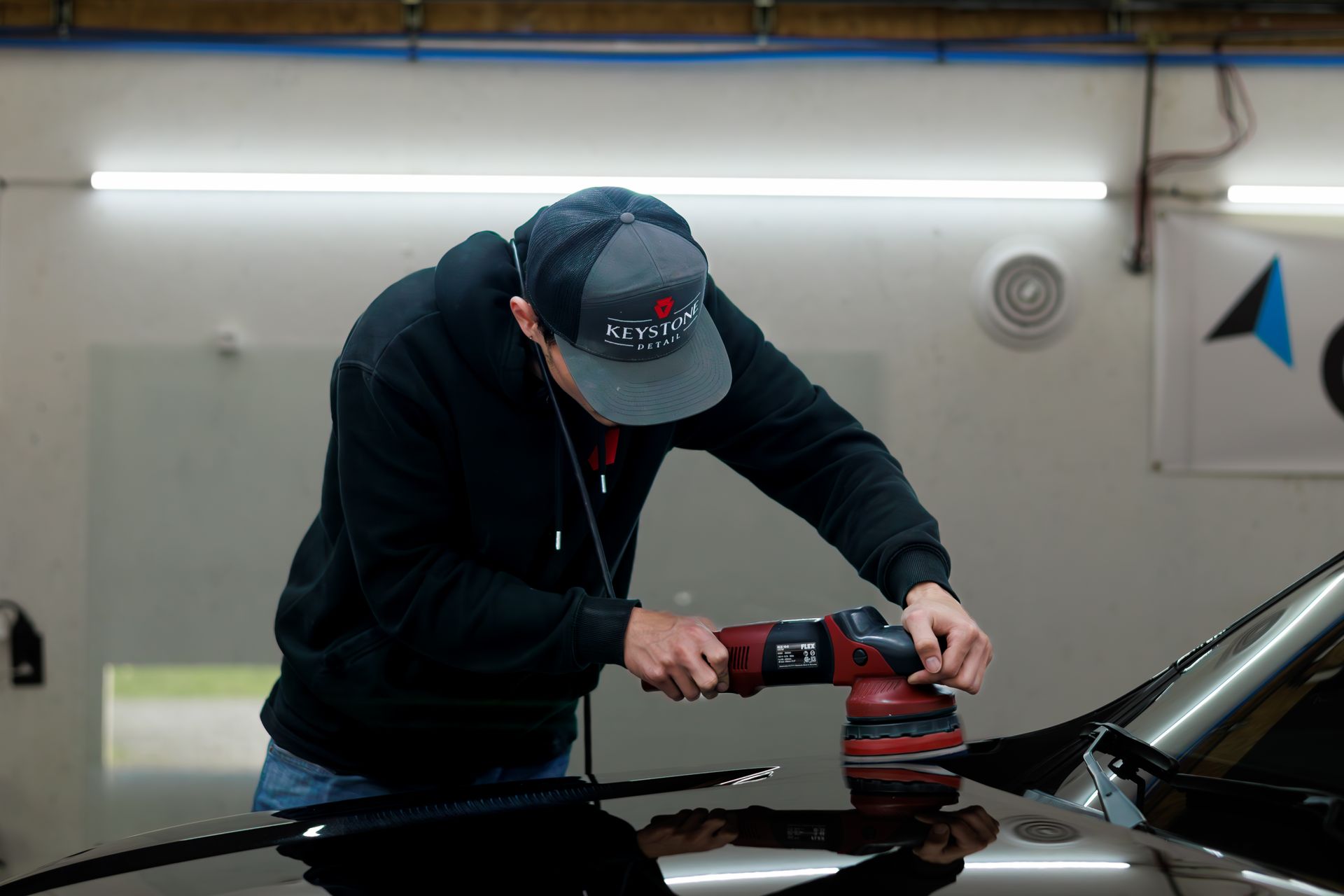 Buffing, polishing, and paint correction on used vehicle to prep for ceramic coating installation in Harborcreek, PA