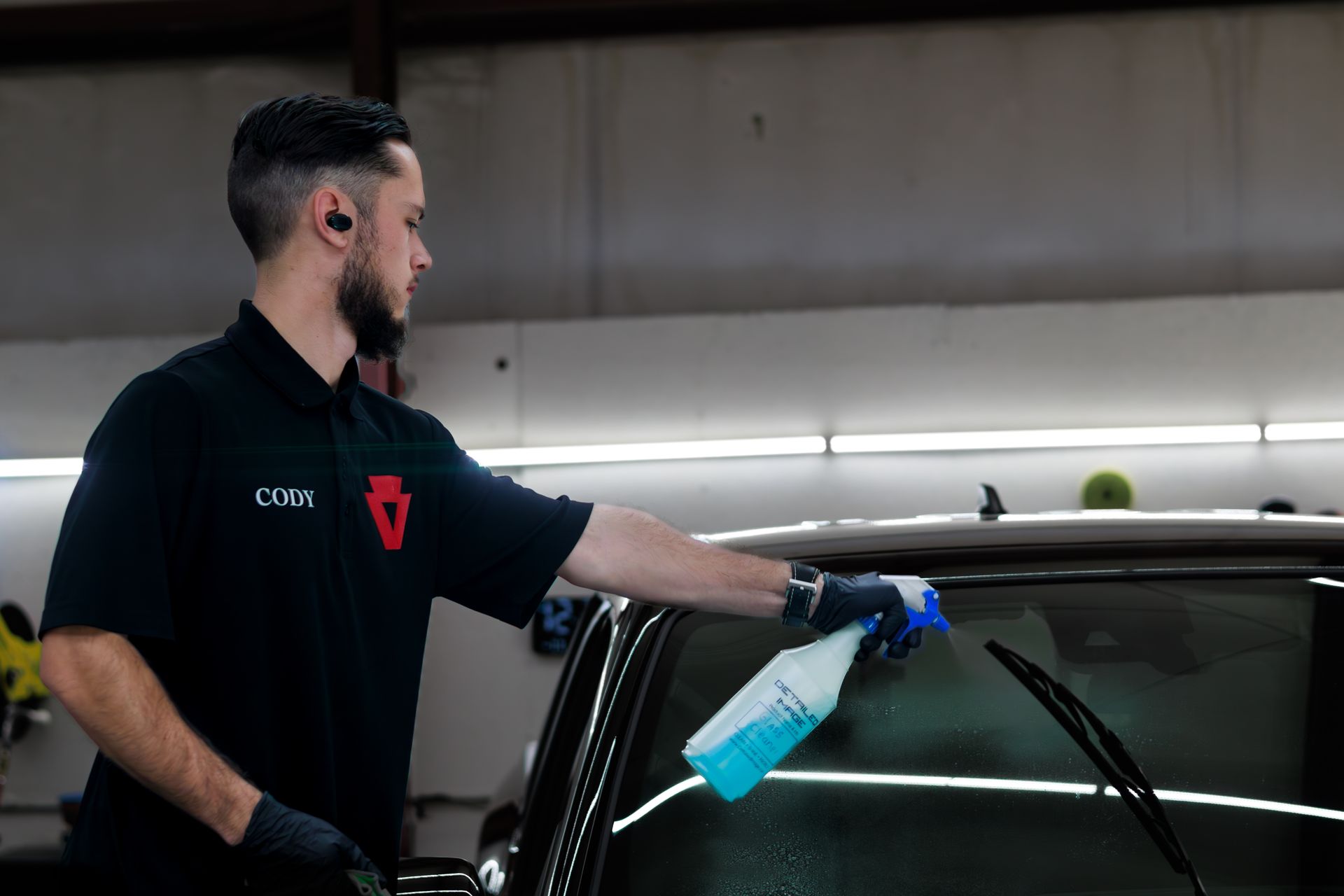 Cleaning windshield glass on brand new vehicle before ceramic coating