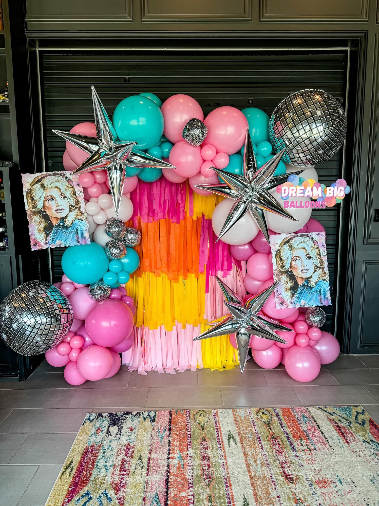dolly parton balloon arch garland fringe backdrop waco texas