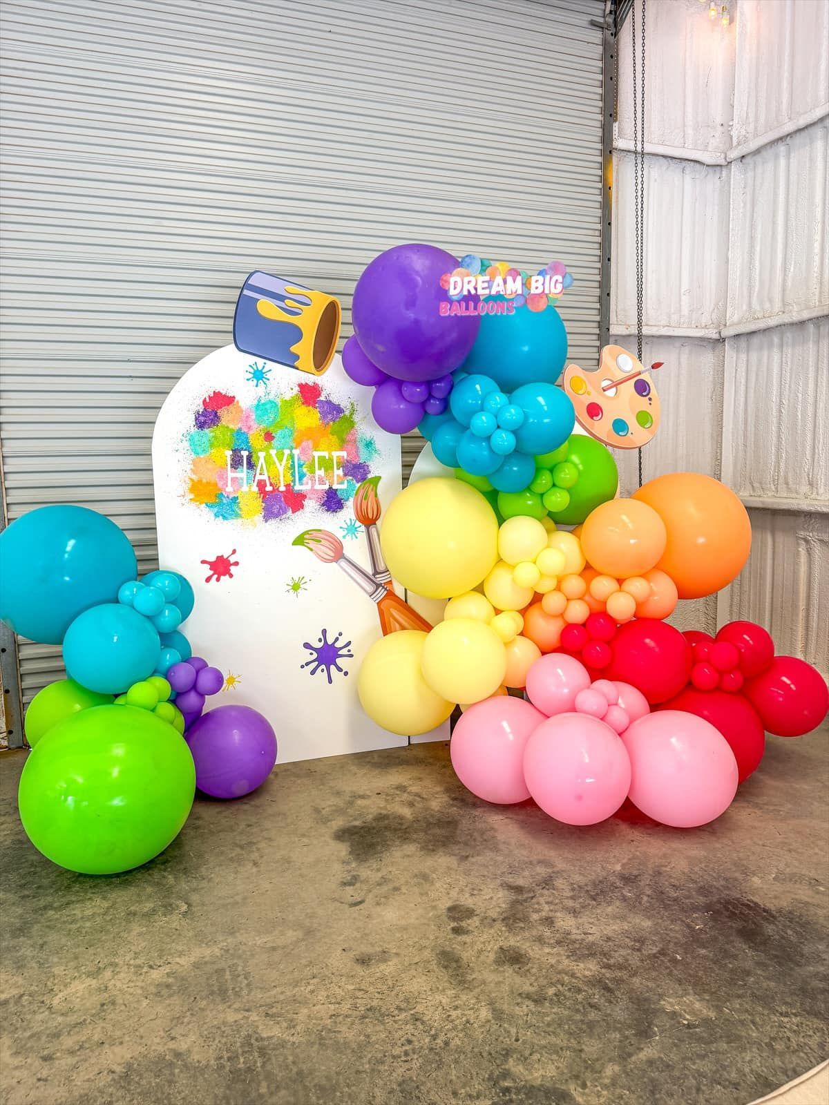 paint party rainbow balloon arch
