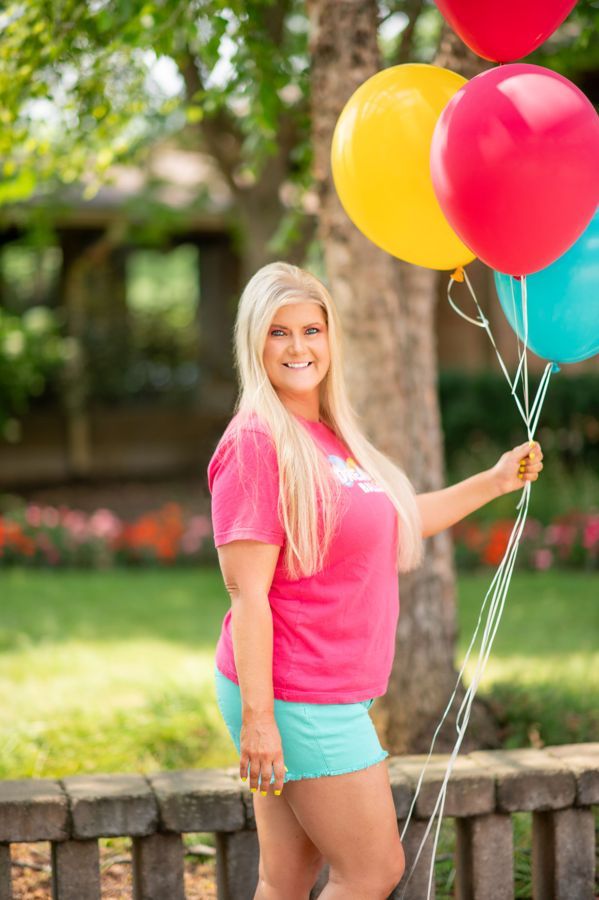 Sheena the business owner in front of Balloon Garland