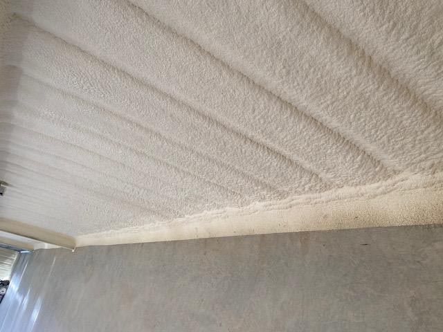 A ceiling with a lot of white foam on it.