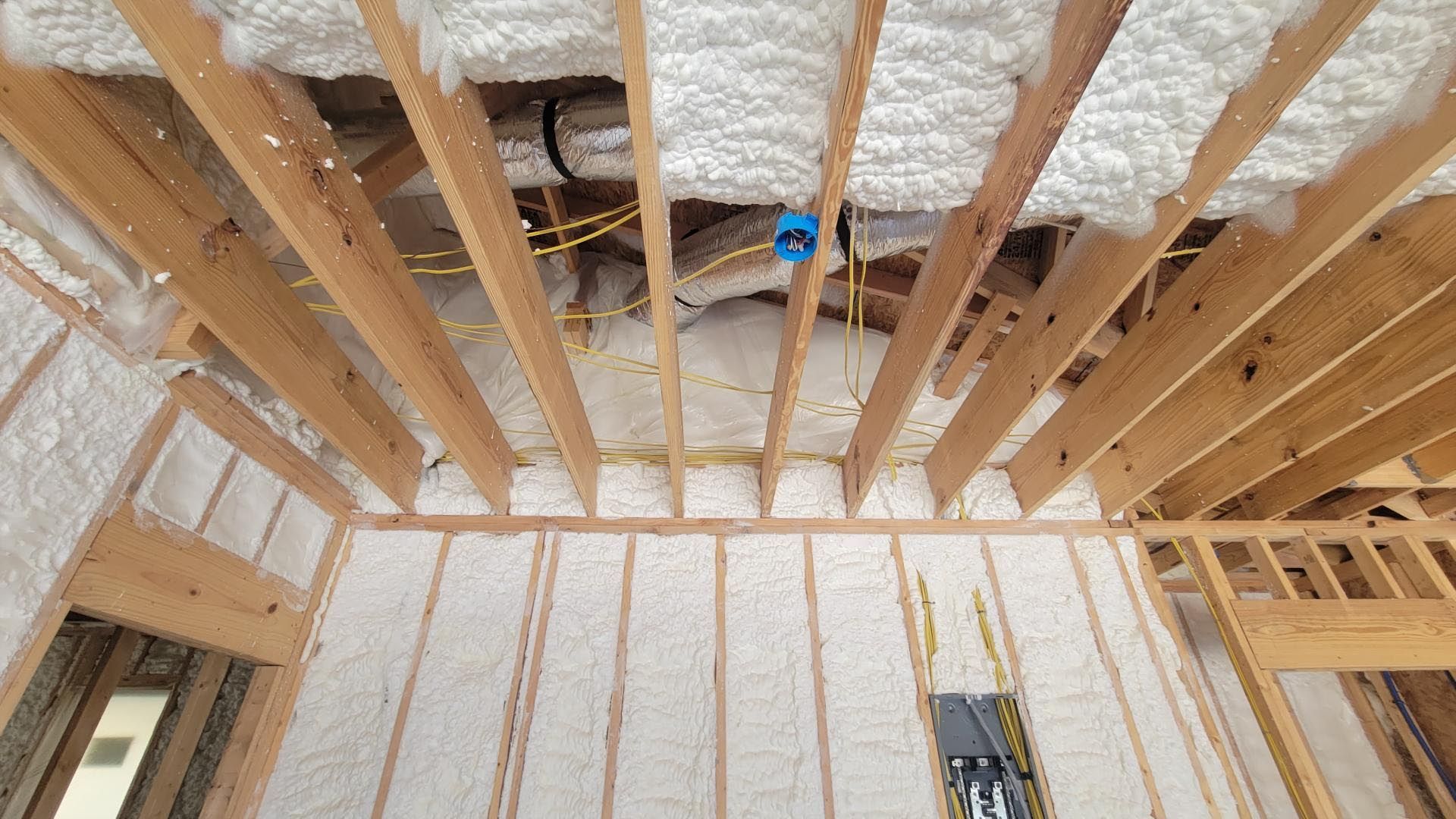 Looking up at the ceiling of a house under construction.