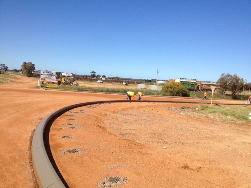 Curve kerb on orange soil | Perth, WA | Kerb Doctor