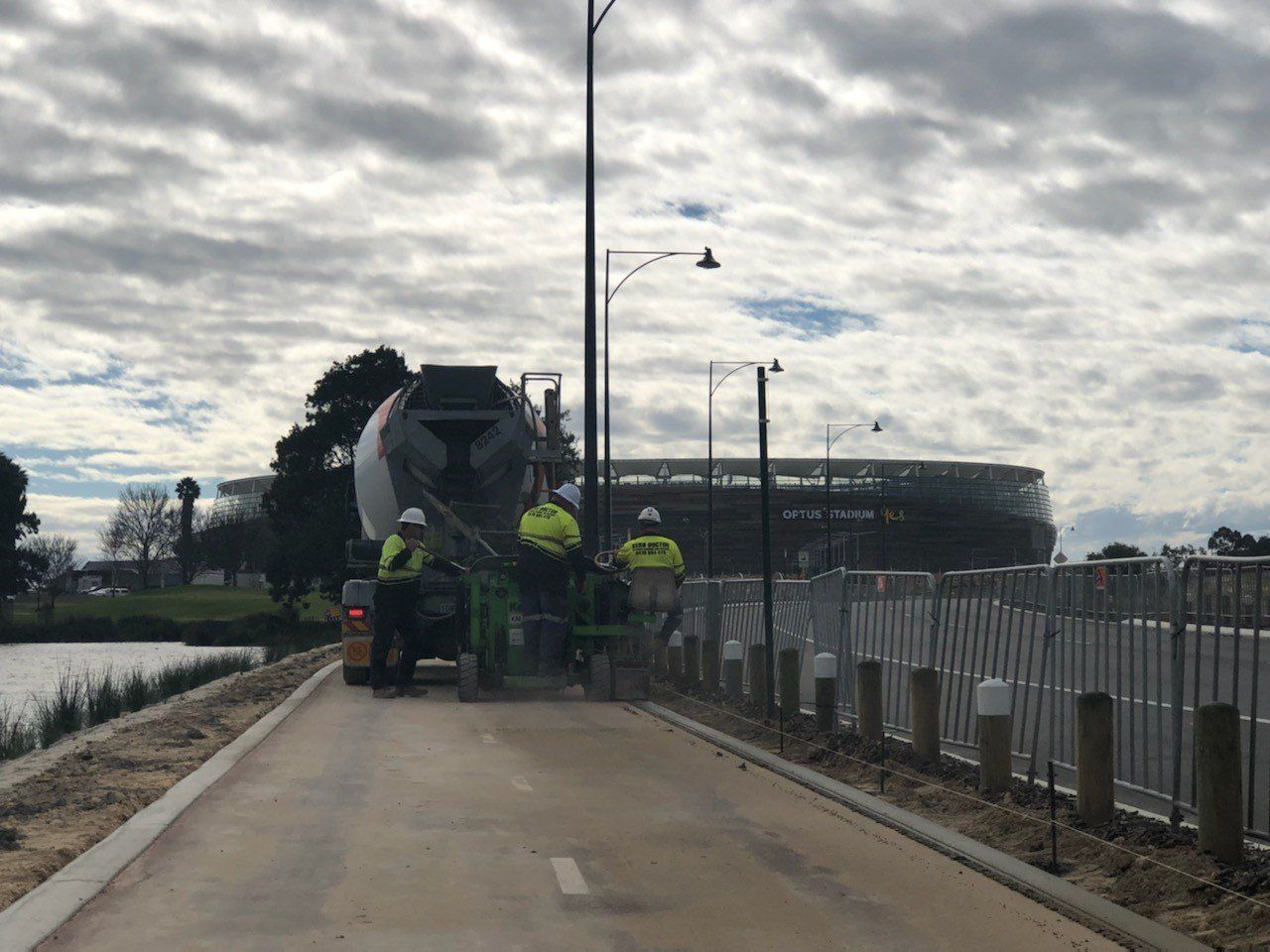 Men making kerb in front of stadium | Perth, WA | Kerb Doctor