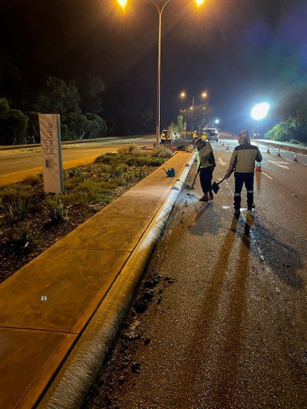 Men working at night repairing kerb | Perth, WA | Kerb Doctor