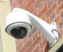 CCTV camera mounted on outside wall