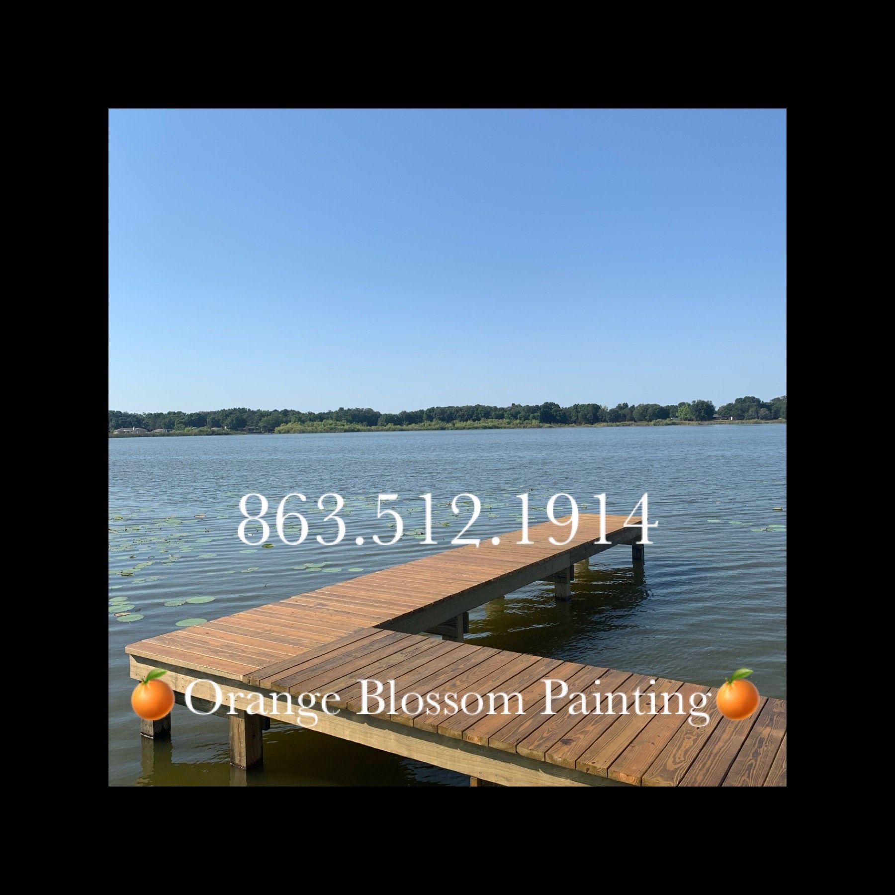 Wooden dock extending into a lake, under a clear blue sky.  Orange Blossom Painting, with phone number 863.512.1914.