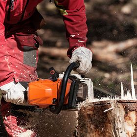 Man Cutting the Stump of a Tree — Washington Township, NJ — KC Tree Service