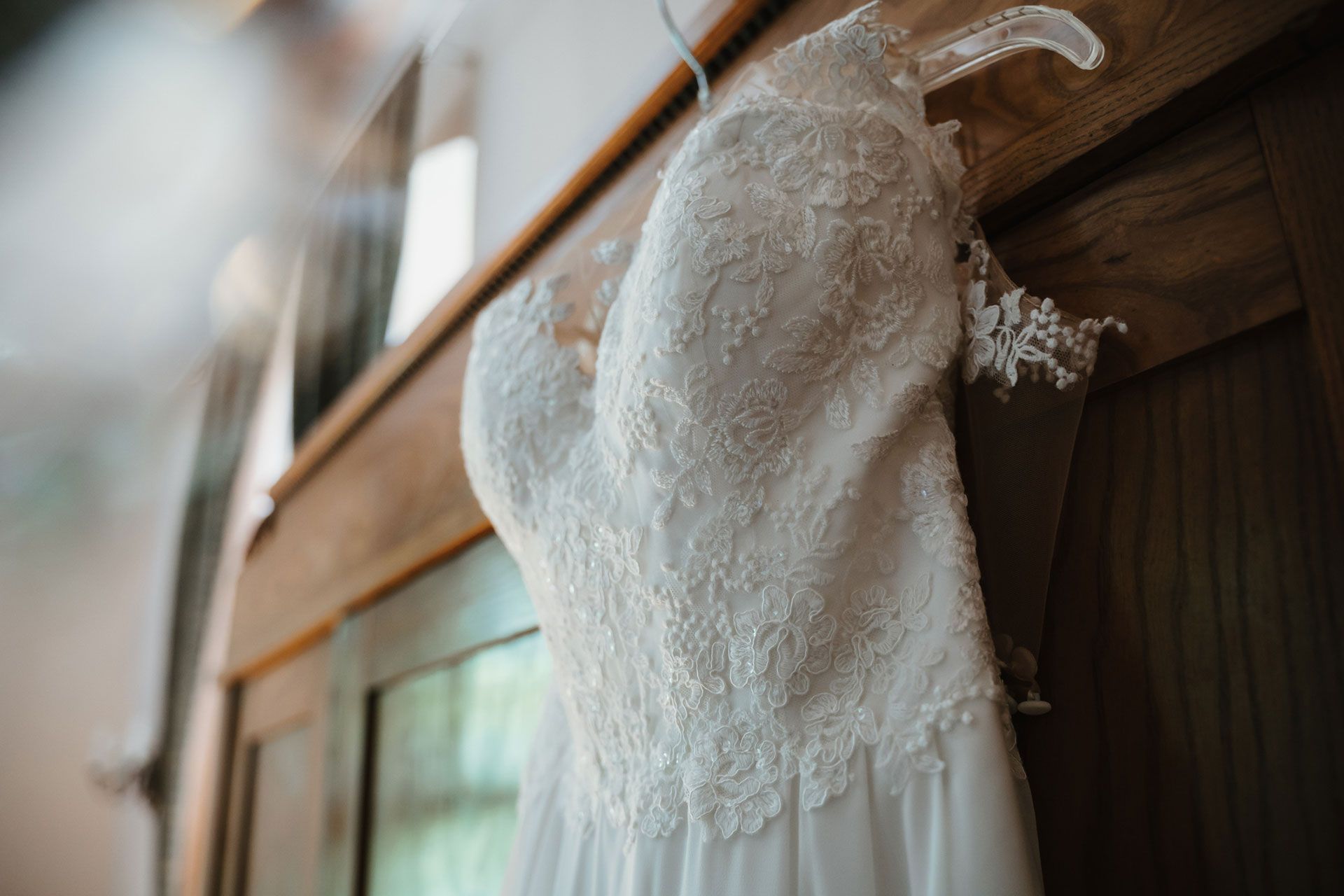 wedding dress hanged on a closet