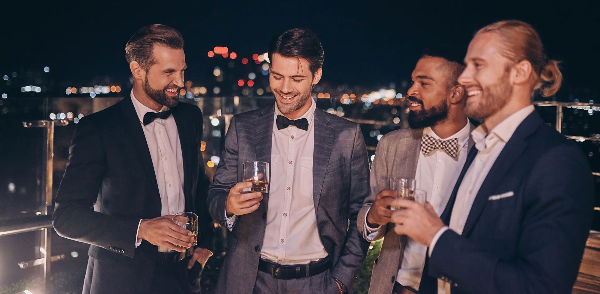 Group of handsome young men in suits