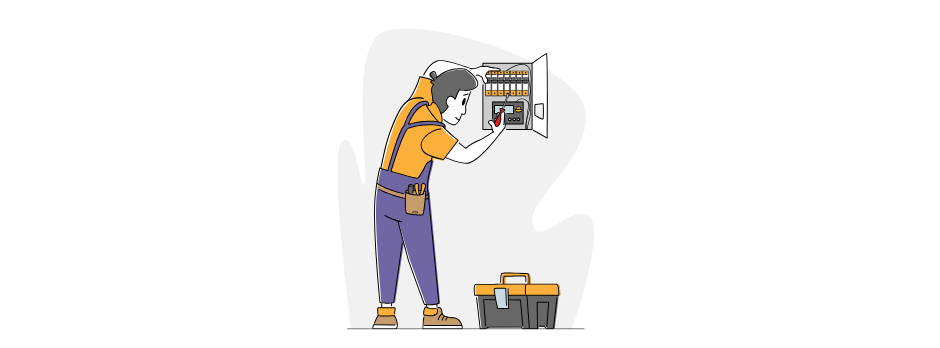A man is standing next to a toolbox and fixing an electrical box.