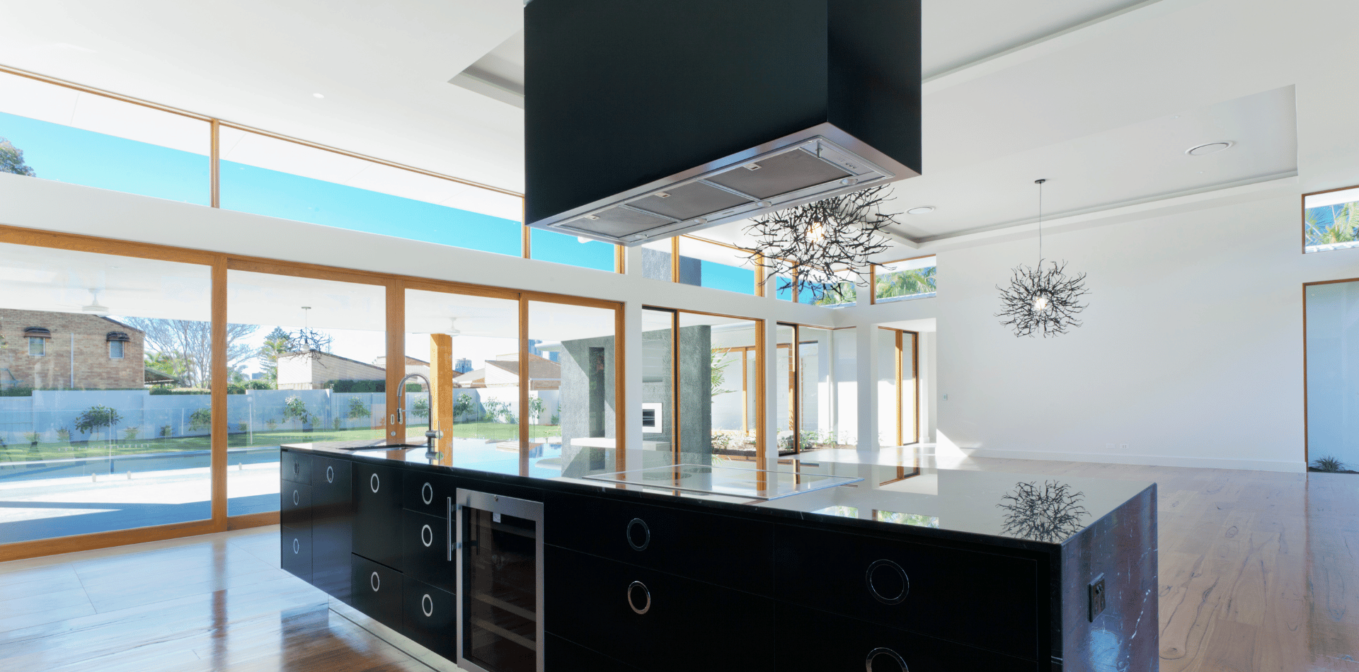 There is a large island in the middle of the kitchen.