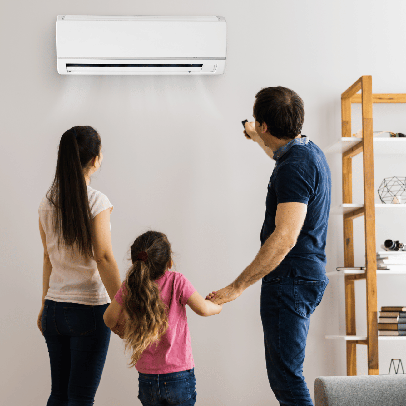 Man using split system air conditioner