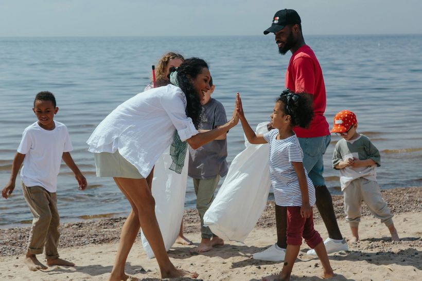 Family picking up trash