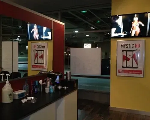 A bathroom with a sign that says mystic hd