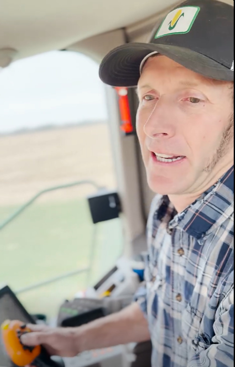 Josh in cab while harvesting