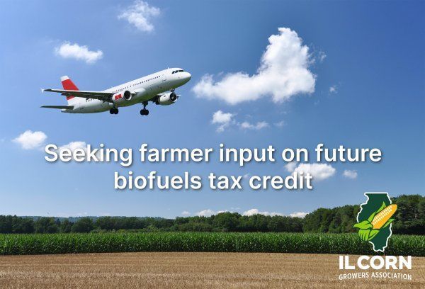 A plane is flying over a field with the words