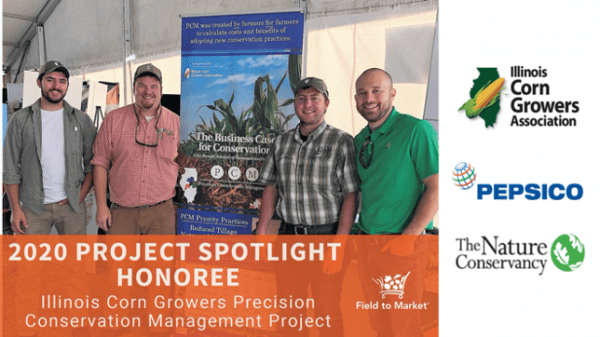 A group of men standing in front of a sign that says 2020 project spotlight honoree