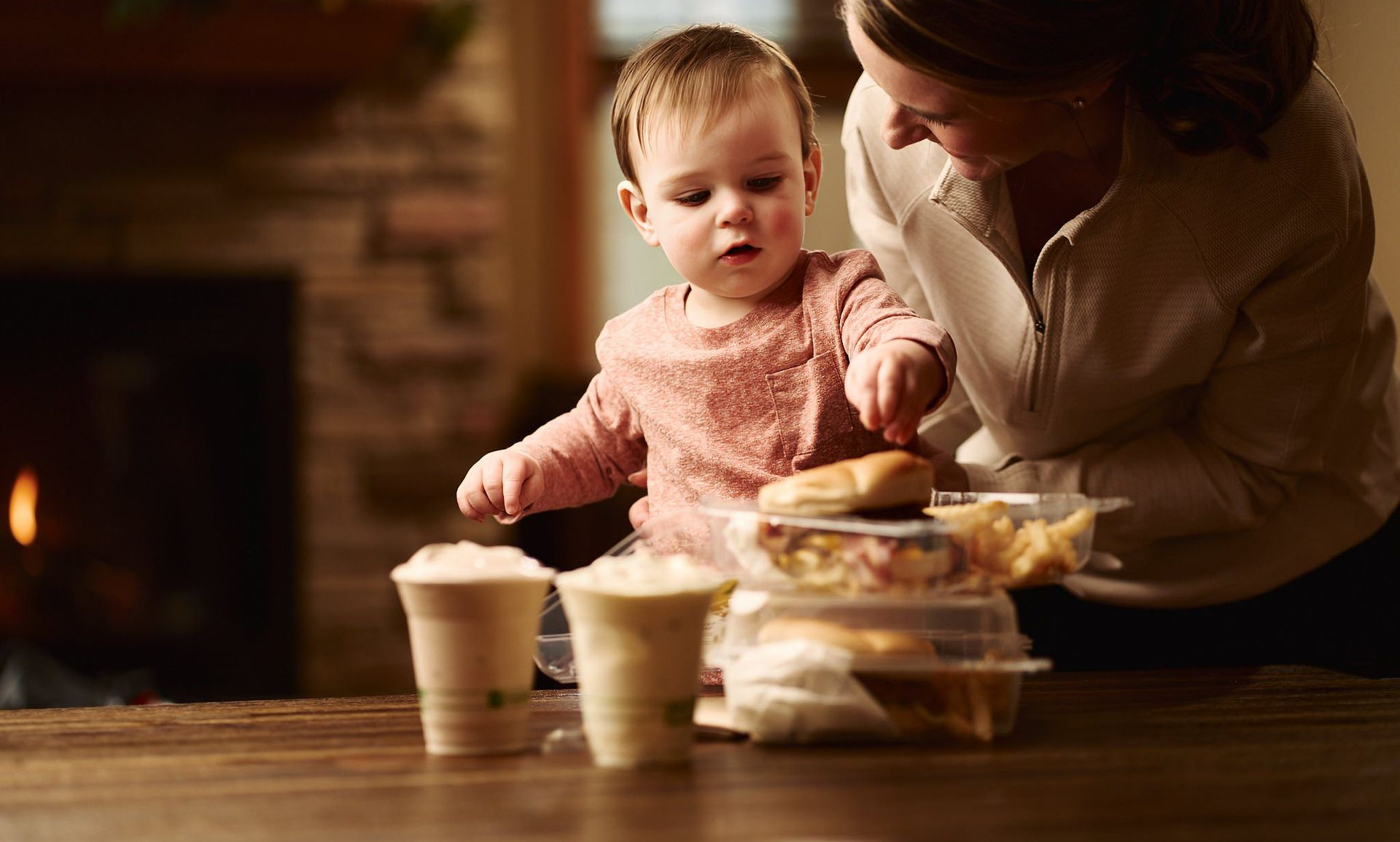 Baby with corn plastic food containers