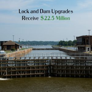 A sign that says lock and dam upgrades receive $ 22.5 million