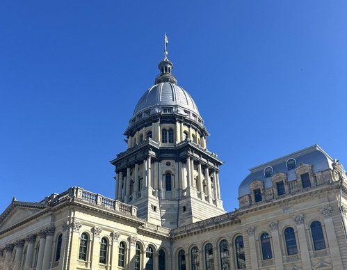 A large building with a dome on top of it
