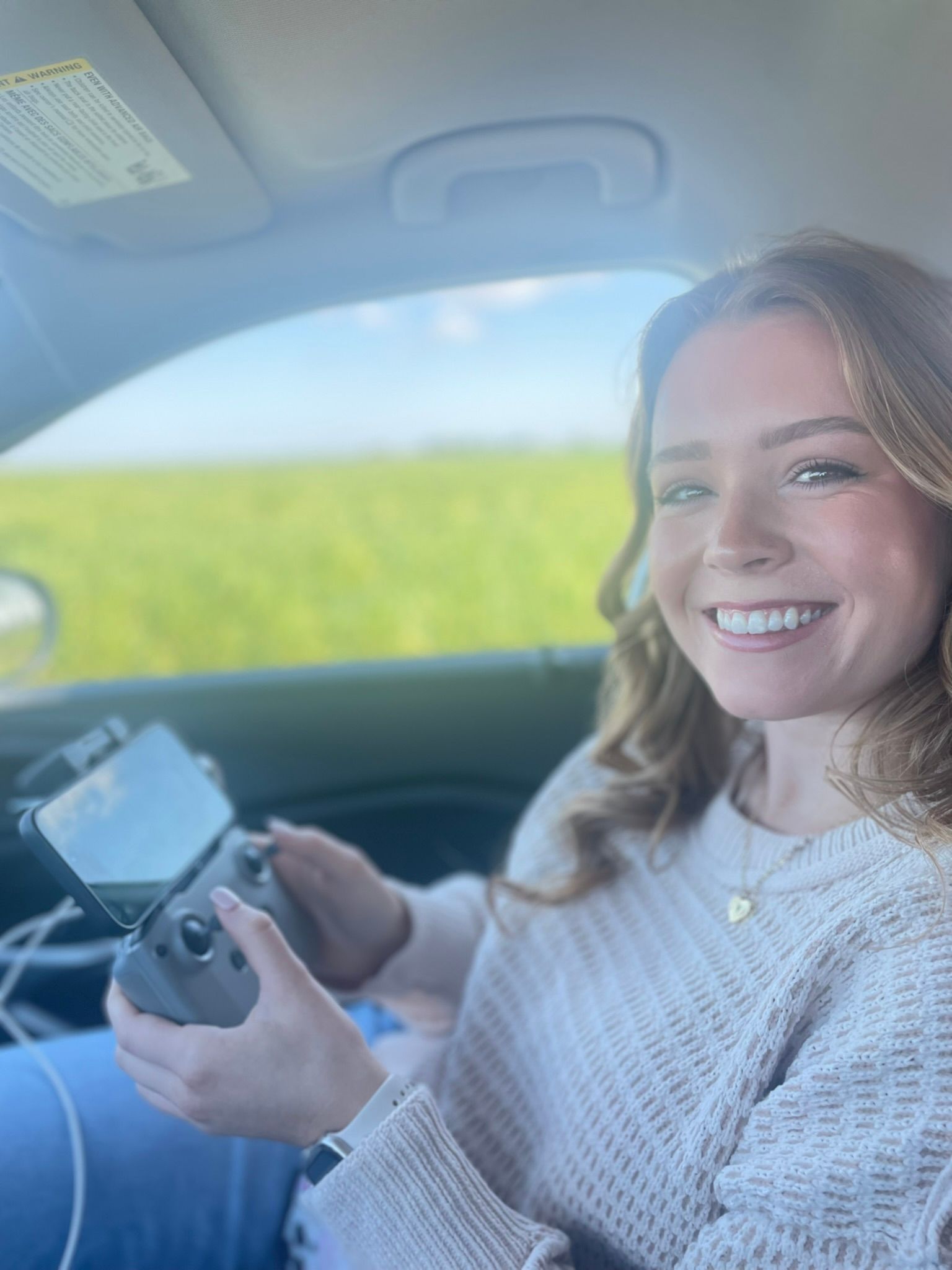 Johnna holding a drone remote