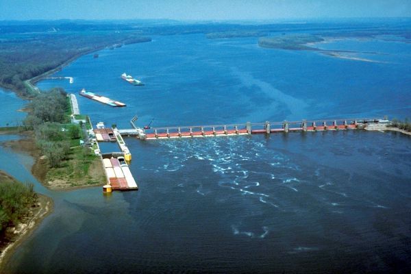 An aerial view of a bridge over a large body of water.