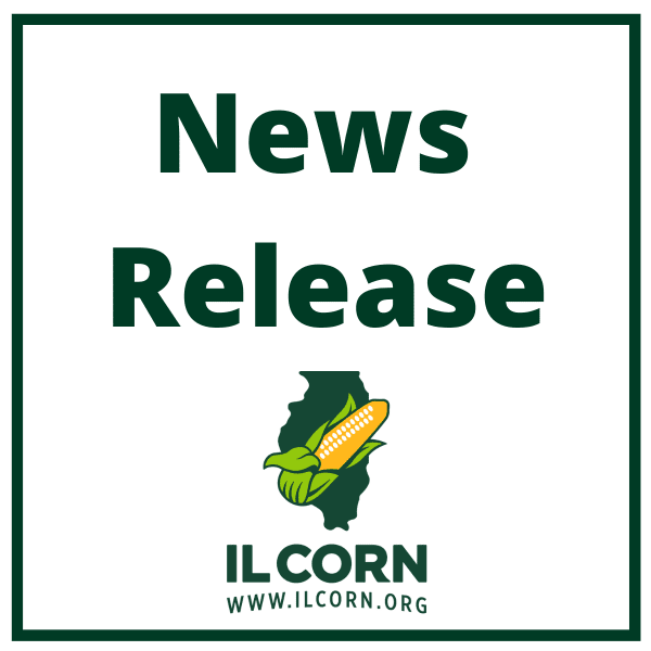 A sign that says `` news release '' with a picture of a corn on the cob.