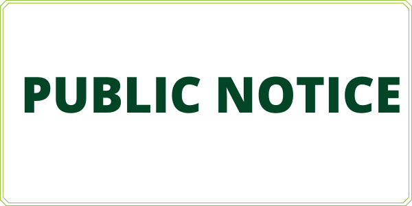 A green sign that says public notice on it