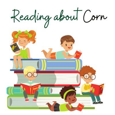 A group of children are reading books while sitting on top of a stack of books.