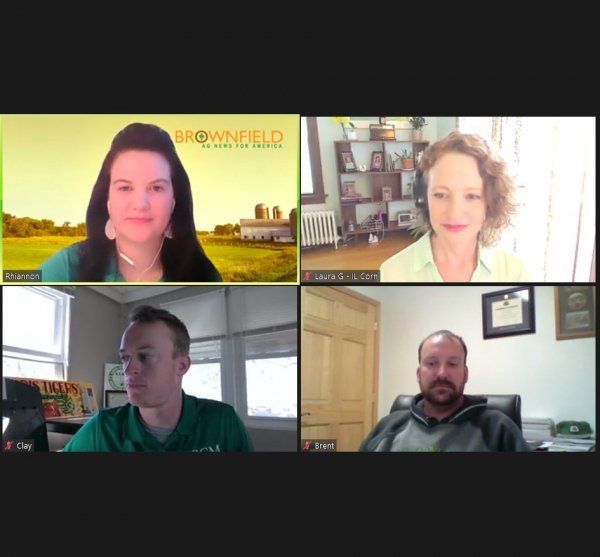 Four people are on a video call with a brownfield logo in the background