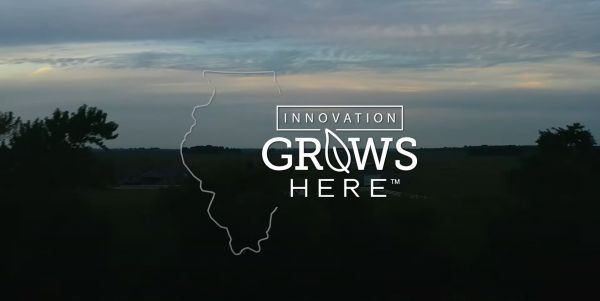 A picture of a field with the words `` innovation grows here '' written on it.