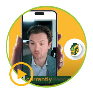 A man is holding a cell phone with the word currently on the screen