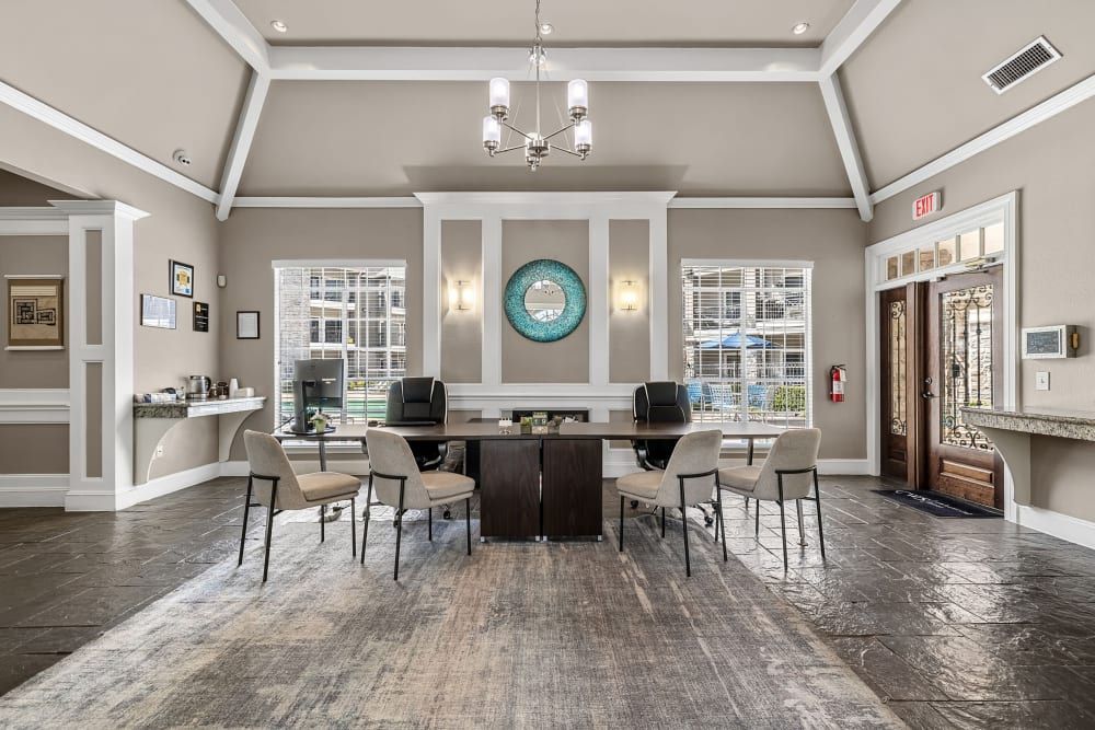 a large room with a table and chairs in it at Marquis on Westheimer in Houston, TX.