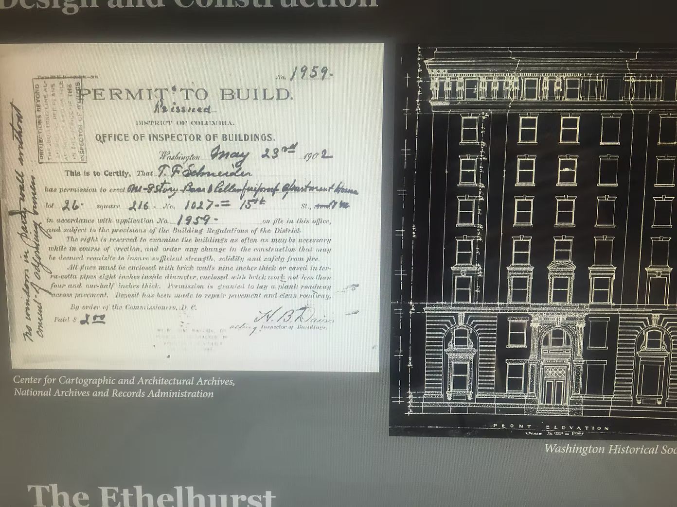 Building permit document and architectural rendering of a building facade.
