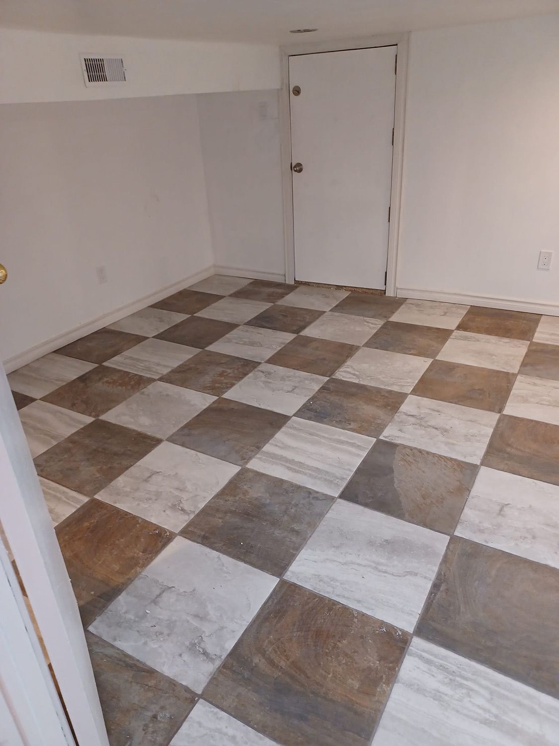 Tile Flooring of Basement — Oshawa, ON — Fire Beard Contracting