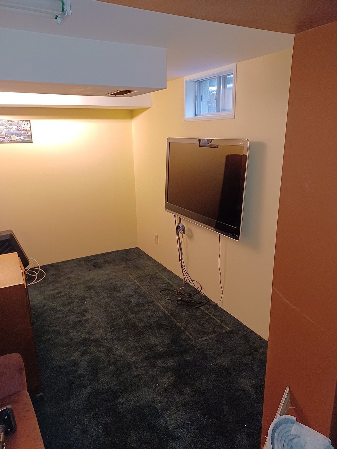 Mounted Television in Basement — Oshawa, ON — Fire Beard Contracting