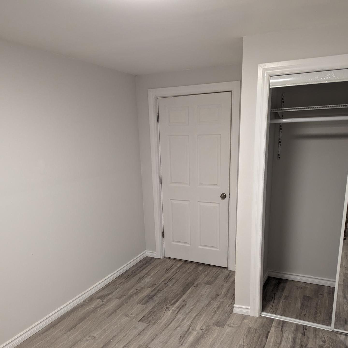 Basement Door and Flooring — Oshawa, ON — Fire Beard Contracting