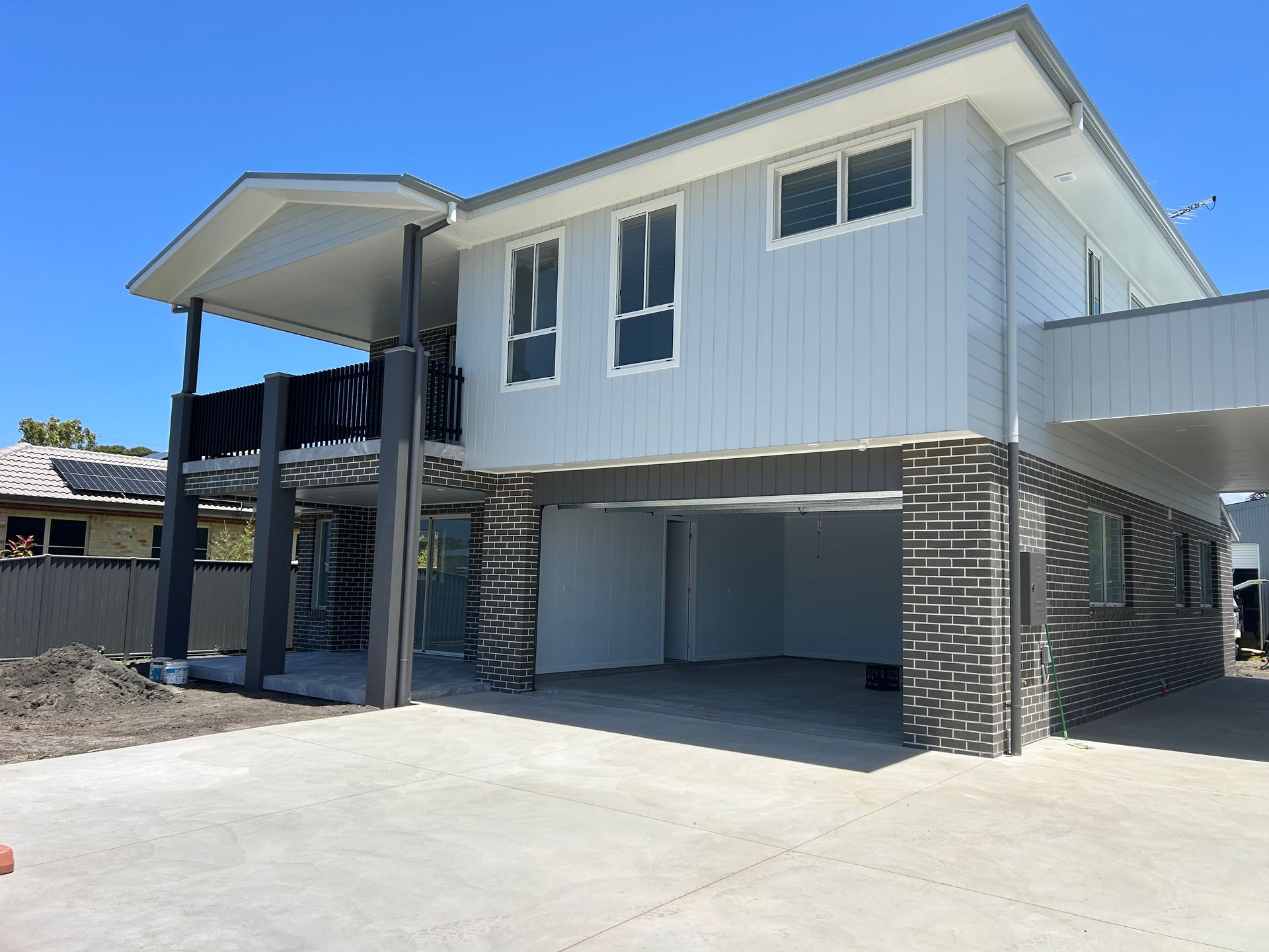 Two-story white house with brick pillars — C & S Building Pty Ltd In Bentley, NSW